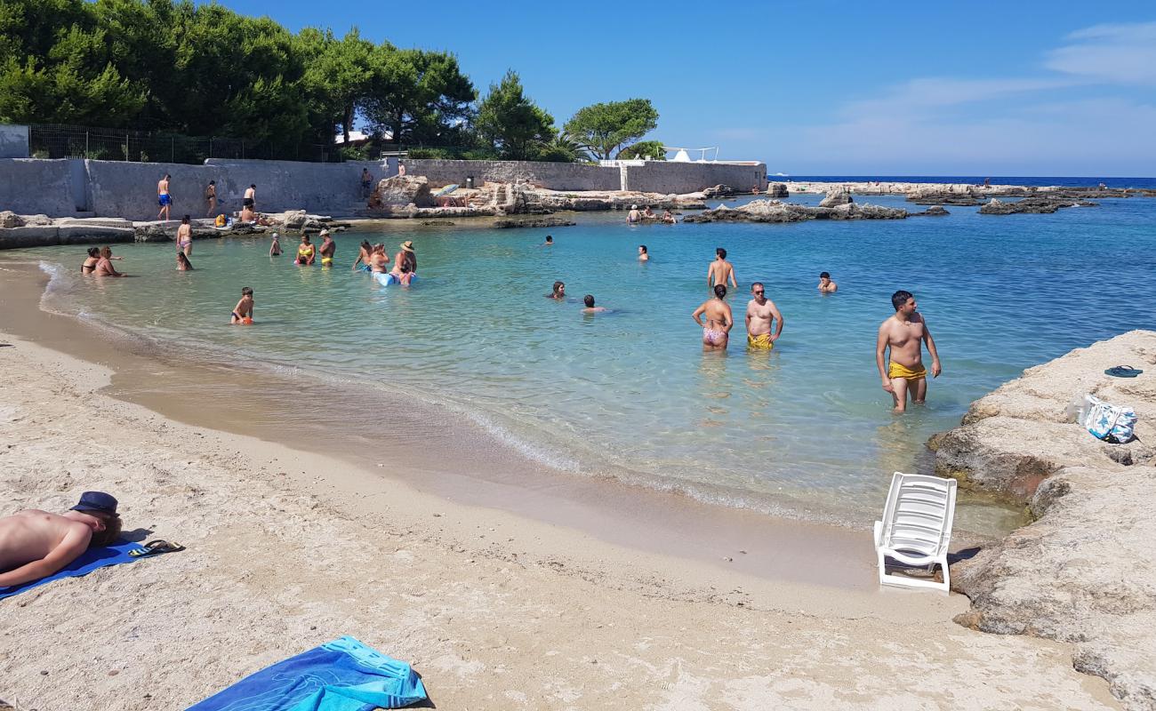 Foto af Porto Cavallo beach med lys sand overflade