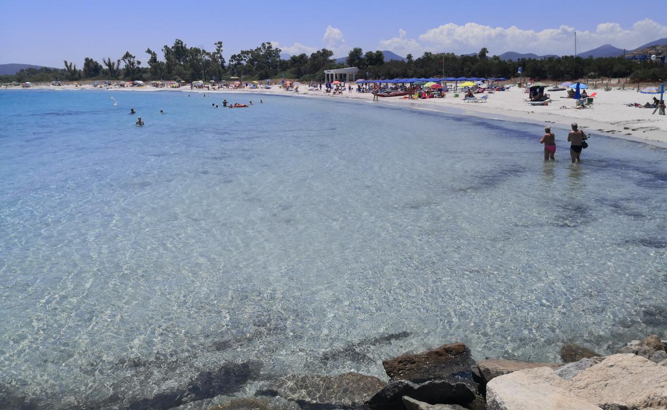 Foto af Porto Ottiolu med lys fint sand overflade