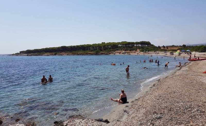 Foto af Porto Ottiolu II med let sand og småsten overflade