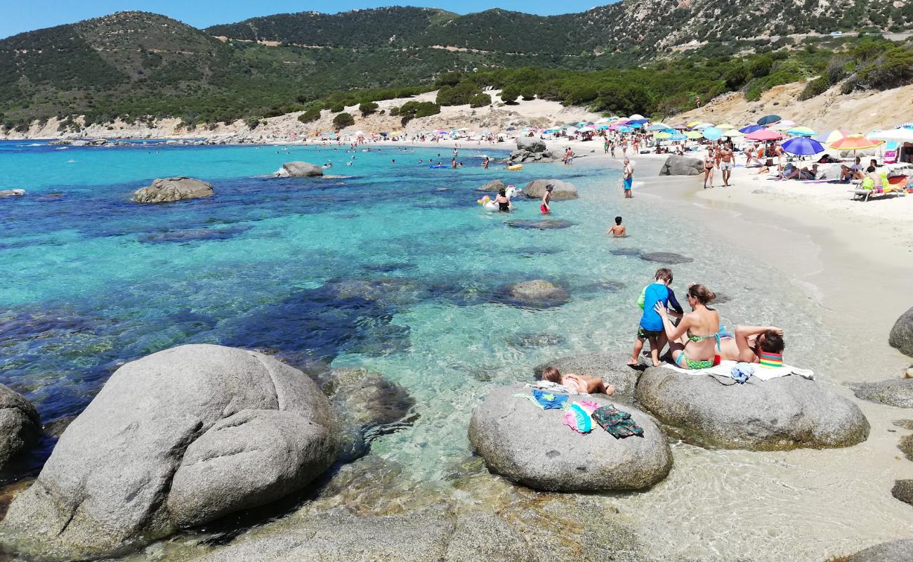 Foto af Stranden Porto Sa Ruxi med lys fint sand overflade