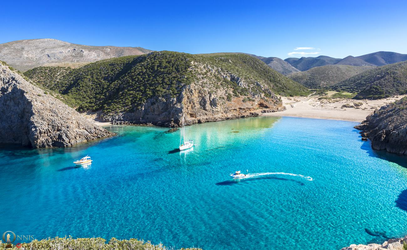 Foto af Cala Domestica Stranden med lys fint sand overflade