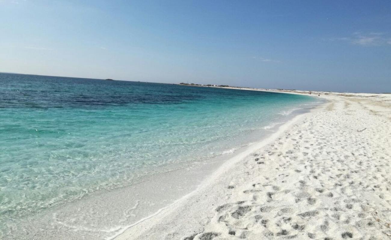 Foto af Spiaggia di Portu S'Uedda med lys sand overflade