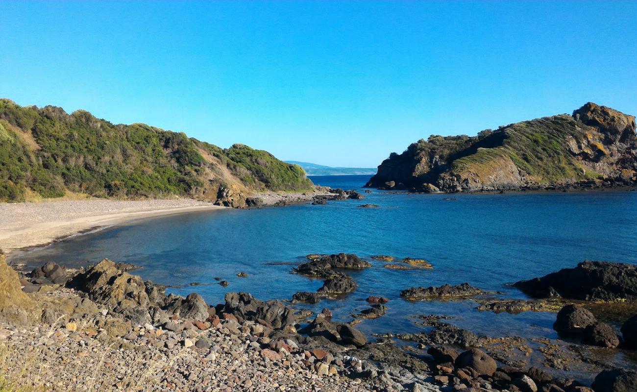 Foto af Porto Managu beach med sten overflade