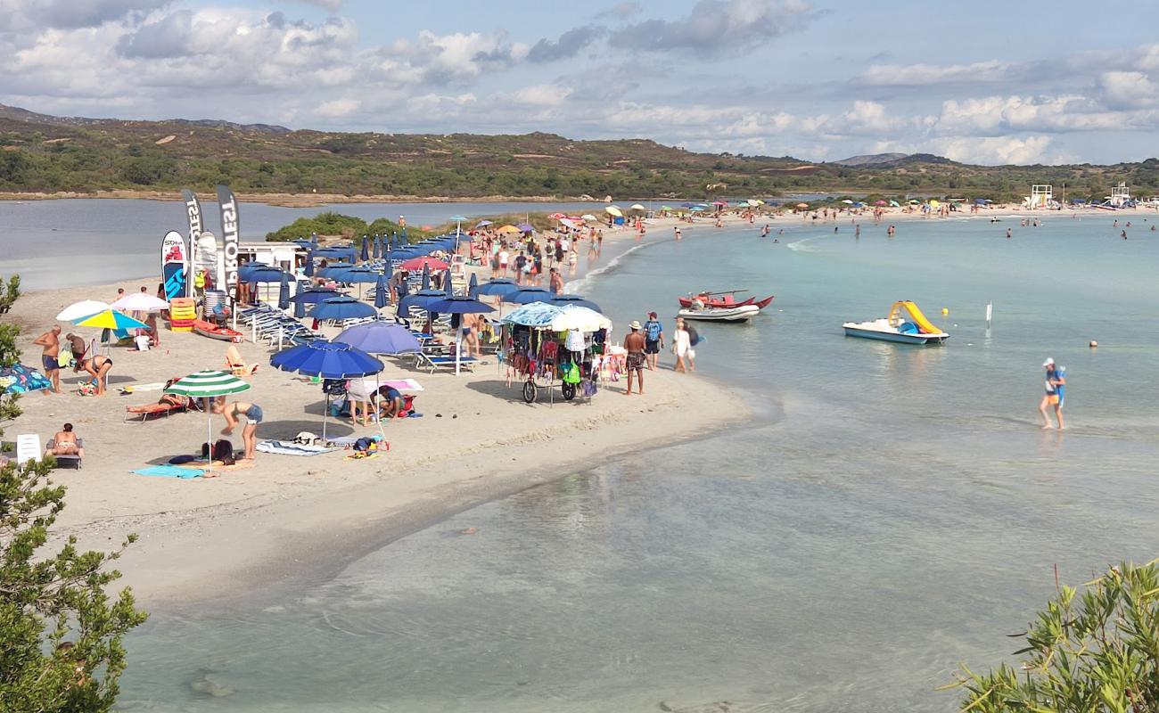 Foto af Spiaggia Lu Postu med lys sand overflade