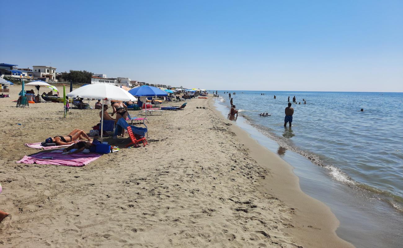 Foto af Spiaggia di Torvaianica med lys sand overflade