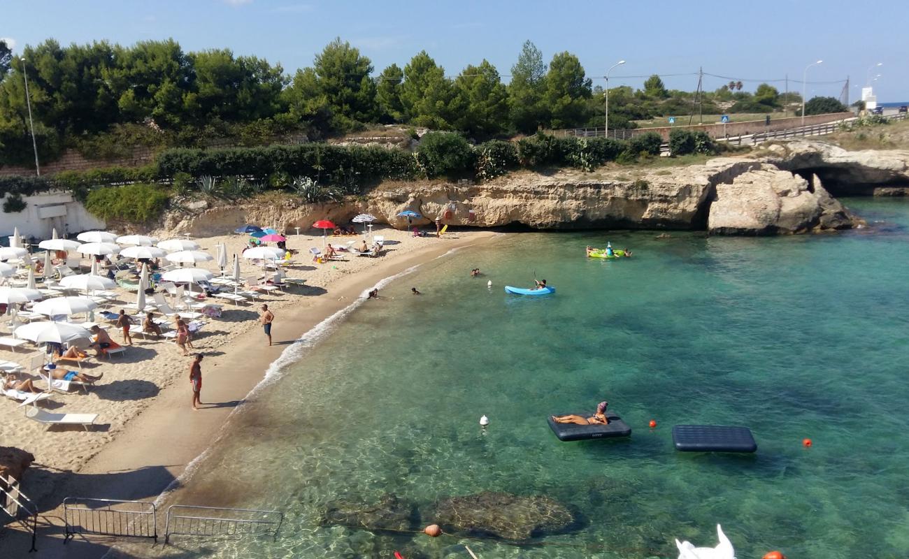 Foto af Porto Giardino Beach med lys sand overflade