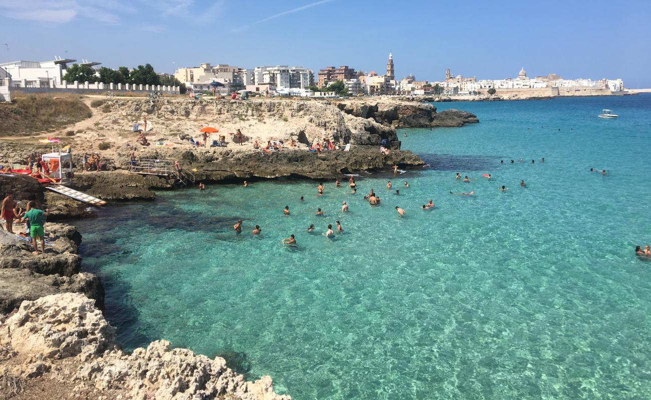 Foto af Cala Porto Nero med betonovertræk overflade