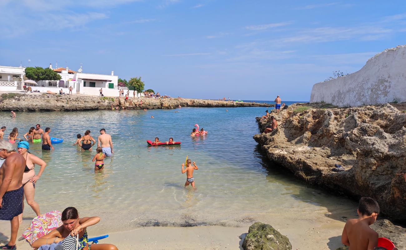 Foto af Spiaggia Porto Contessa med lys sand overflade