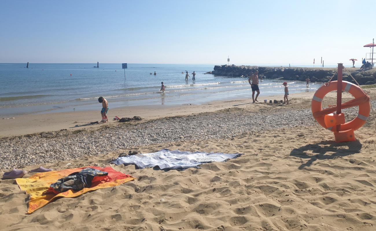 Foto af Spiaggia dei PuraVida med grå sand overflade