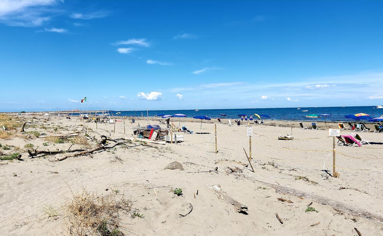 Foto af Spiaggia di Ca Roman med lys sand overflade