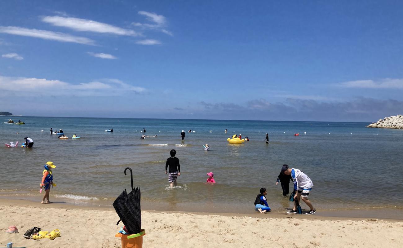 Foto af Namae Beach med lys sand overflade