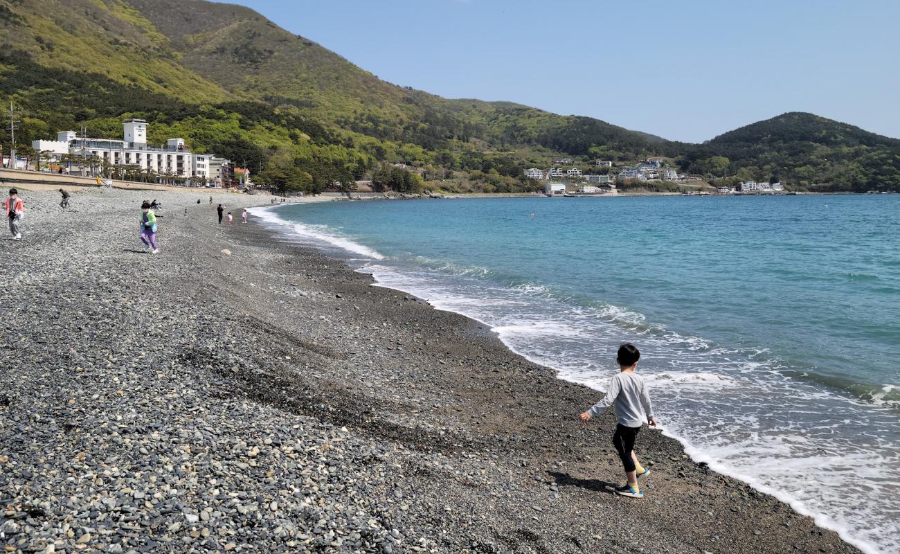 Foto af Hakdong Black Pearl Beach med grå sten overflade