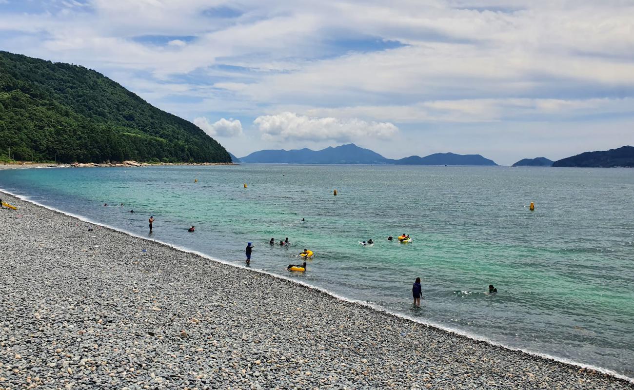 Foto af Bongam Beach med grå sten overflade