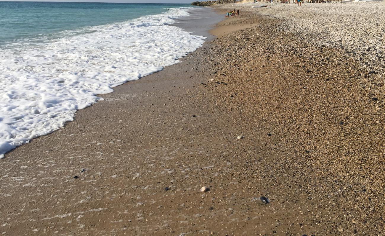 Foto af Okaibe Beach med let sten overflade