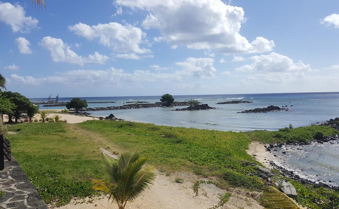 Foto af Pointe Aux Biches med lyst sand & sten overflade