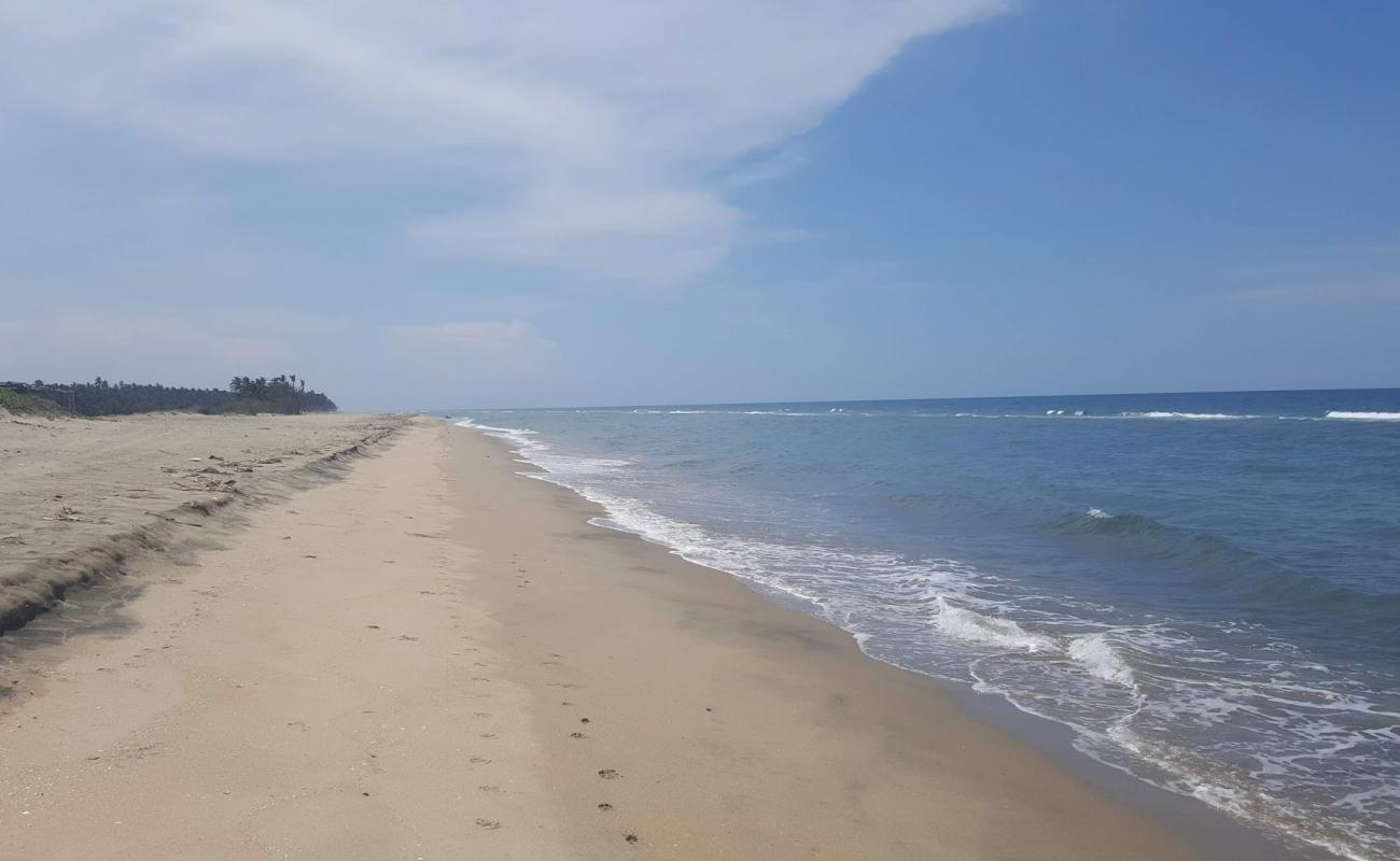 Foto af Tupilco Beach med lys sand overflade