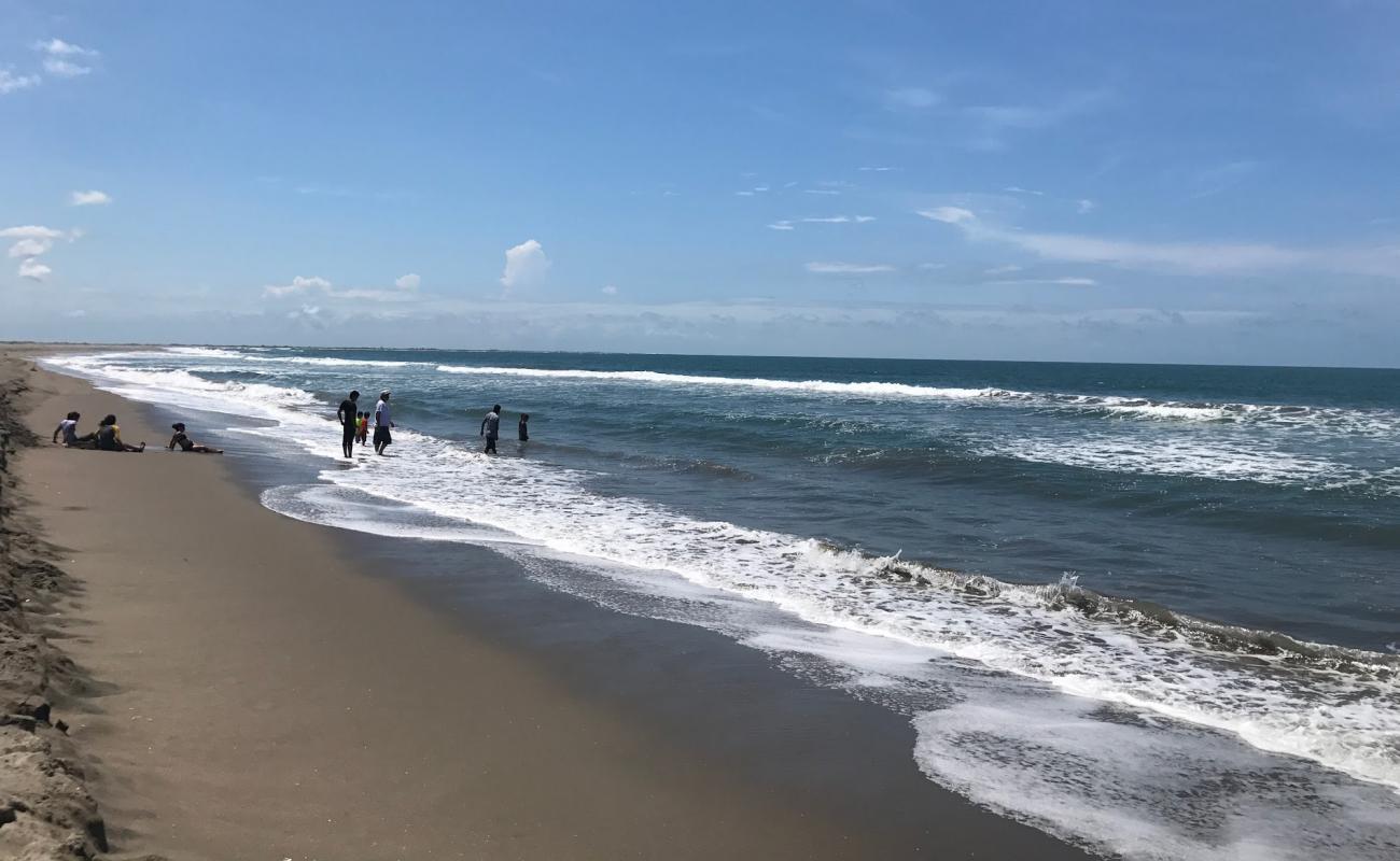 Foto af El Tambor beach med lys sand overflade