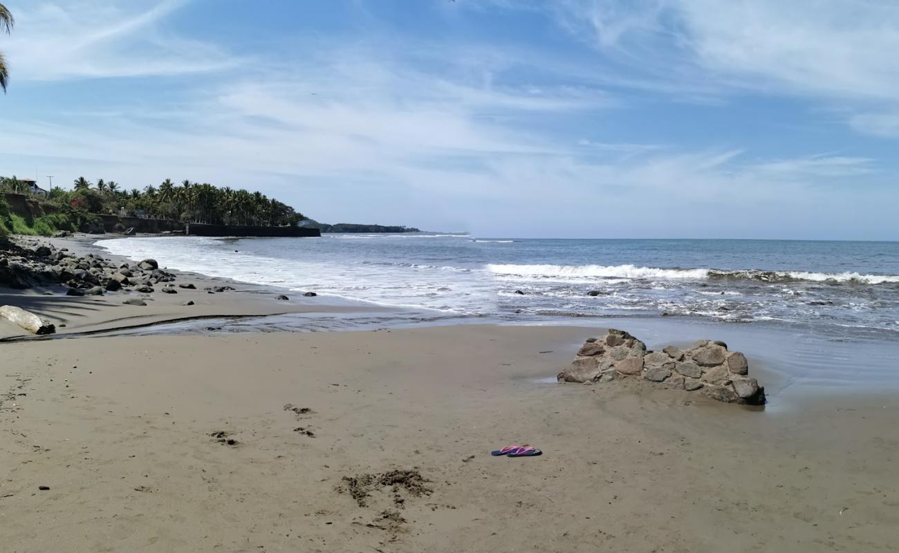 Foto af La Manzanilla beach med grå sand overflade