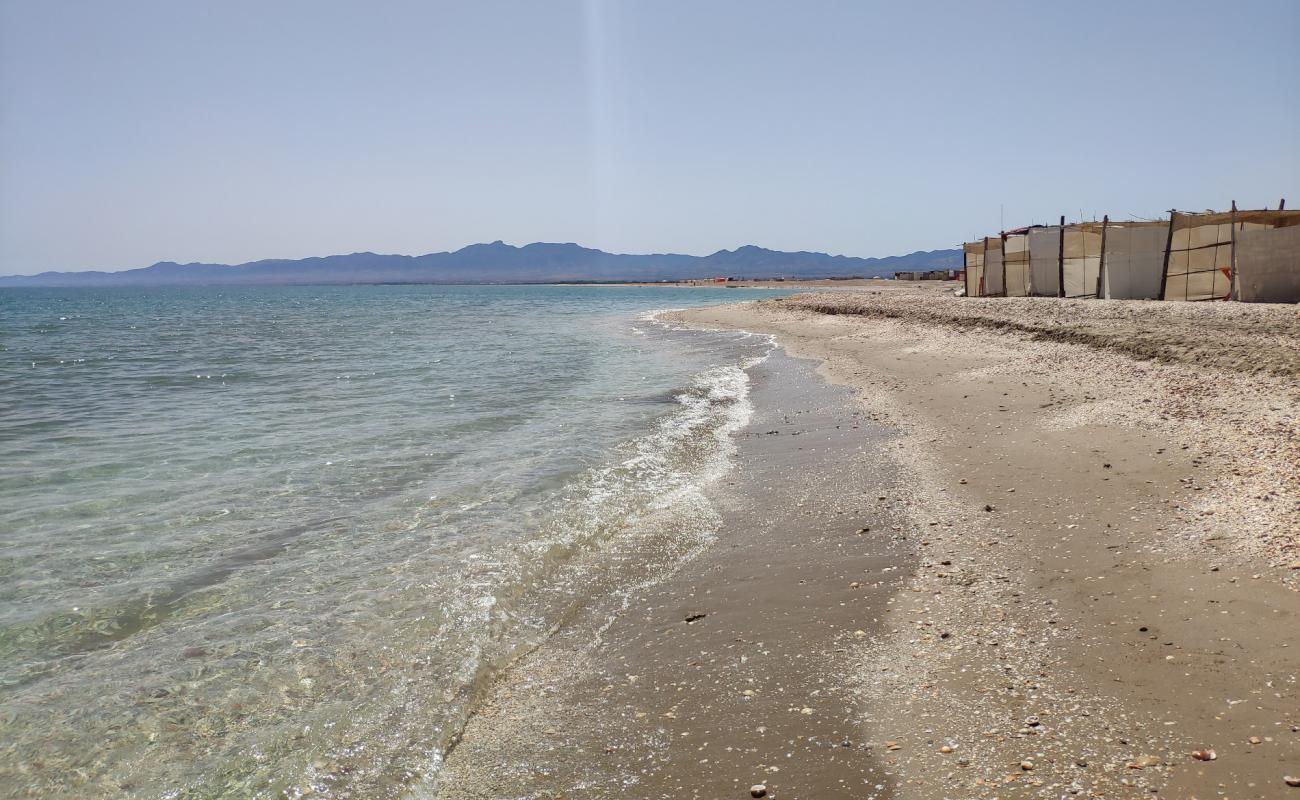 Foto af Pores beach med lys sand overflade