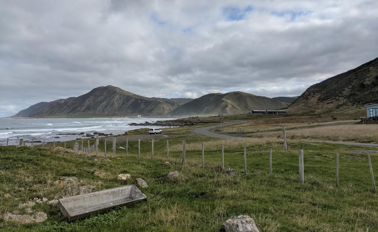 Foto af North Tora Beach med grå sand overflade