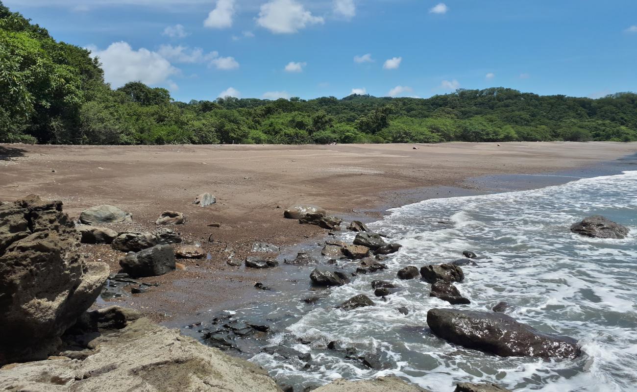 Foto af Escameca Strand med lys sand overflade