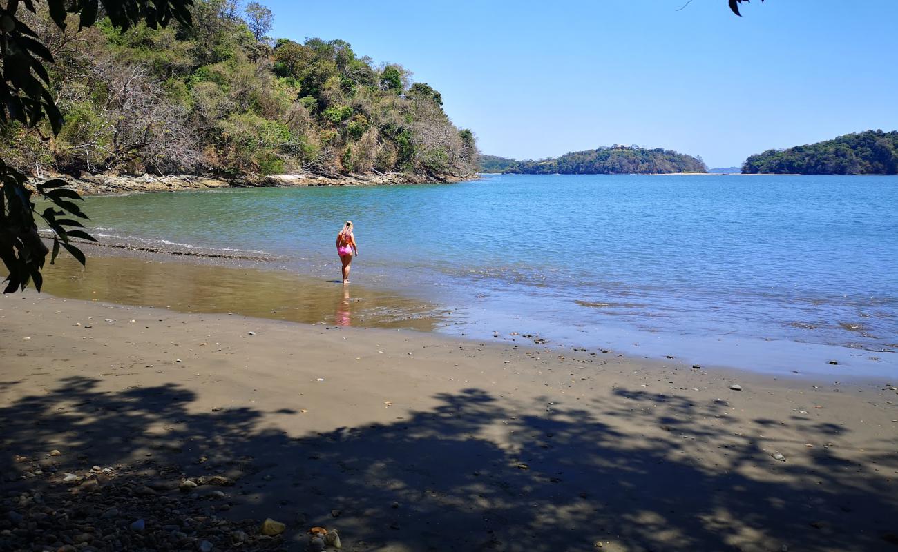 Foto af Playa Christina med brunt sand overflade