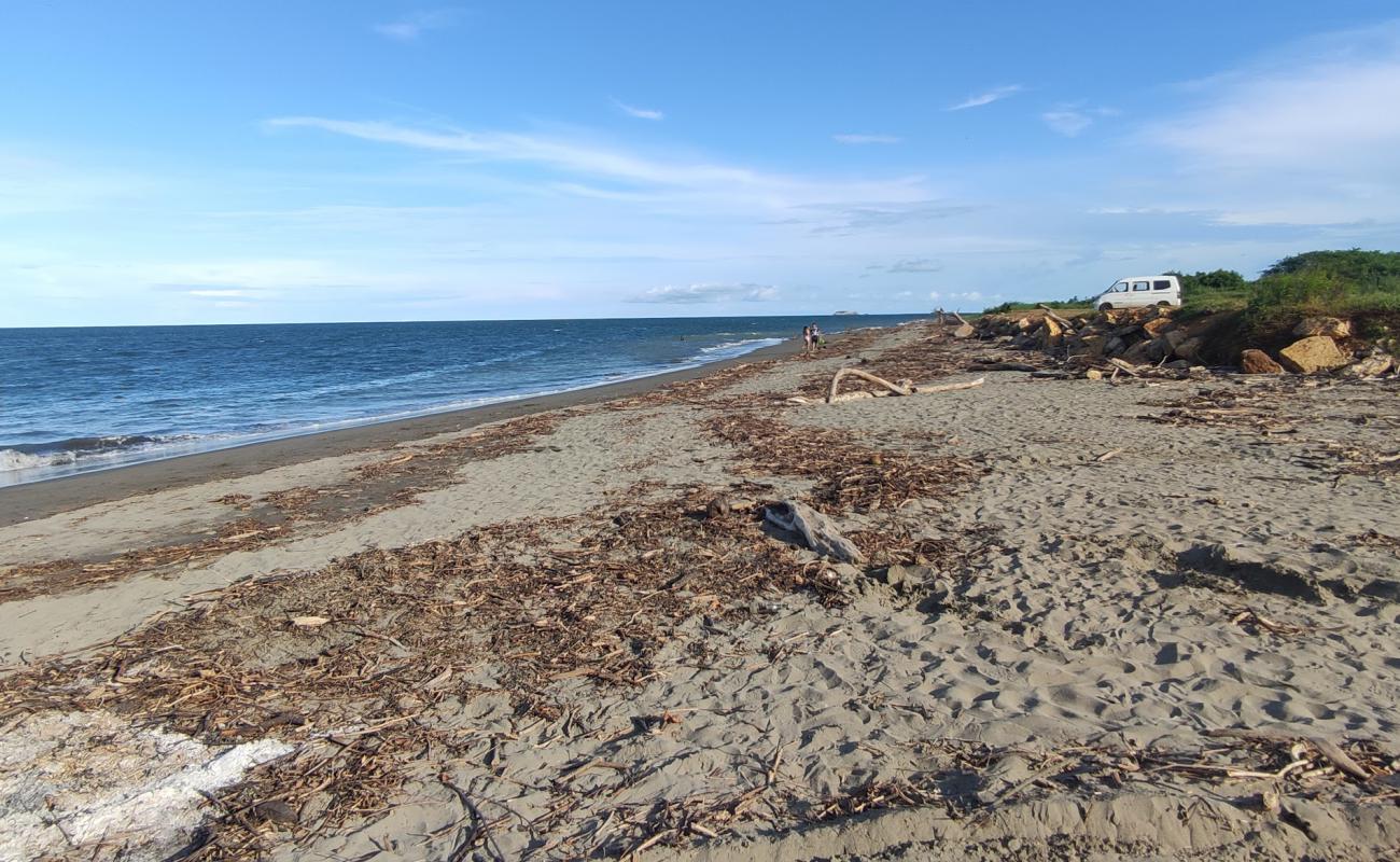 Foto af Monagre Beach med brunt sand overflade