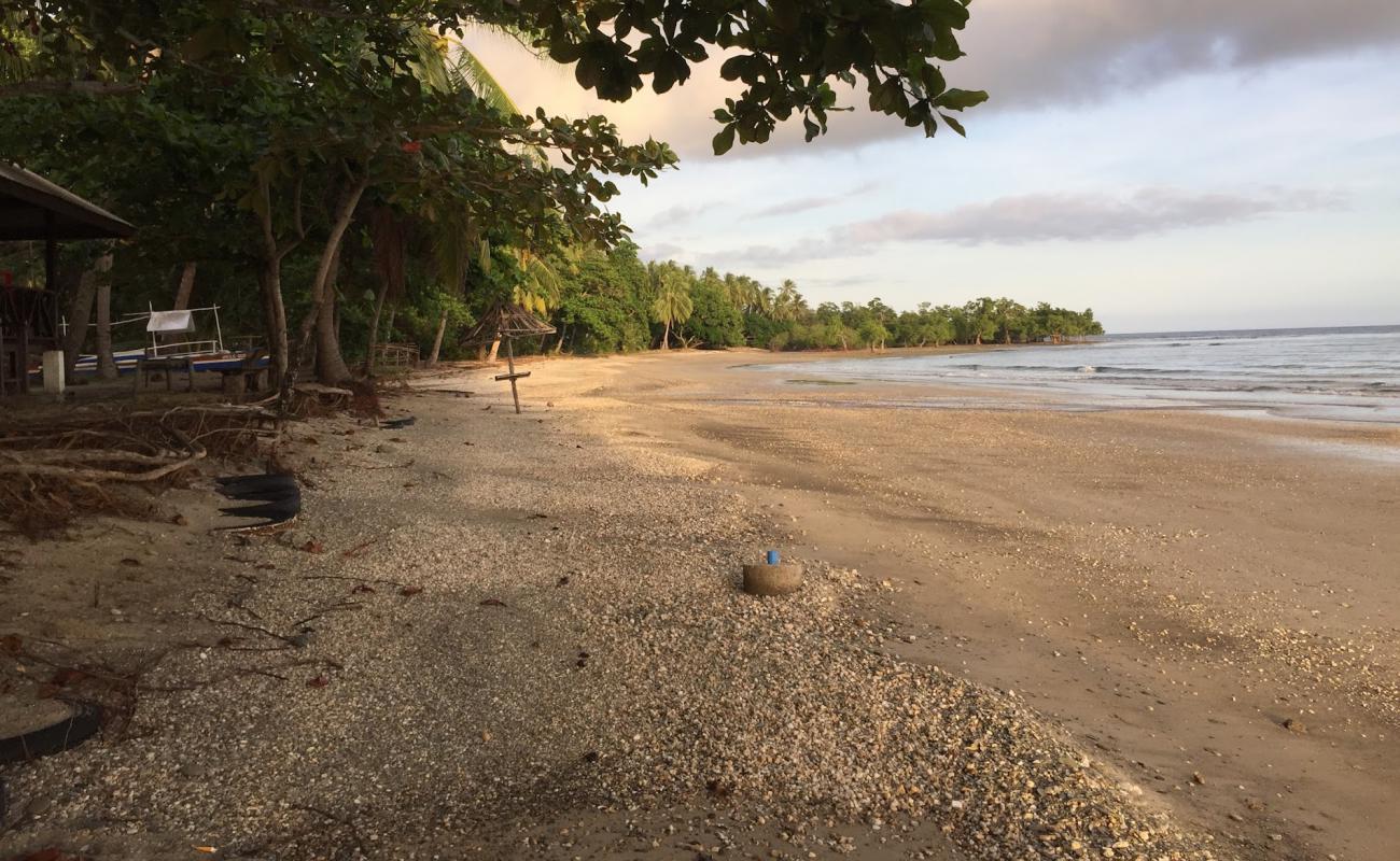 Foto af Langogan Beach med lys sand overflade