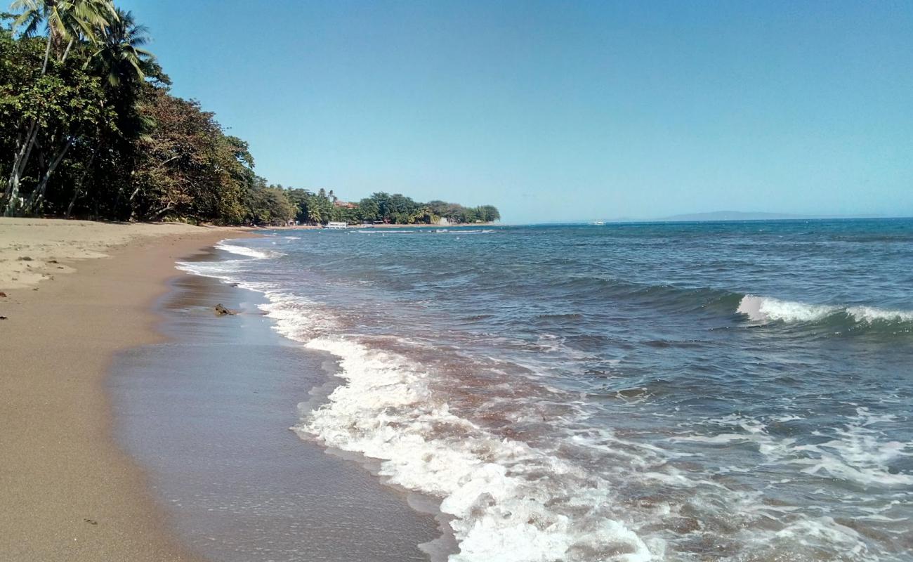 Foto af Uzi's Beach med lys sand overflade