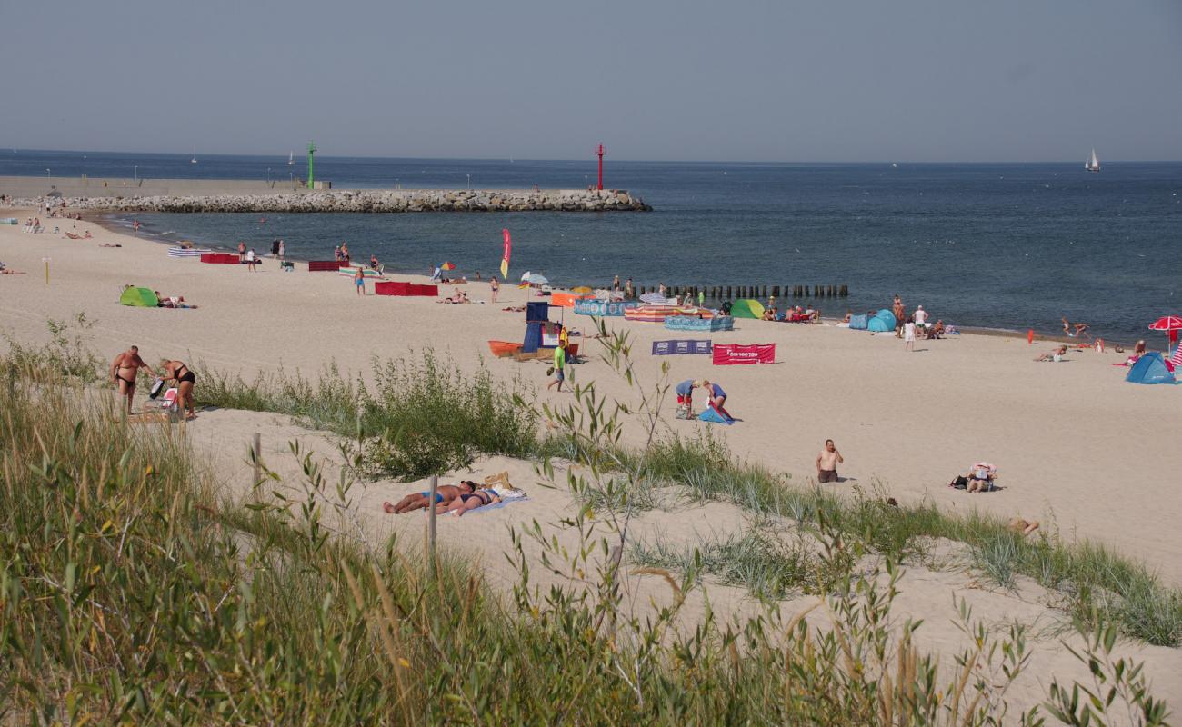 Foto af Plaza wschodnia Dziwnow med lys fint sand overflade