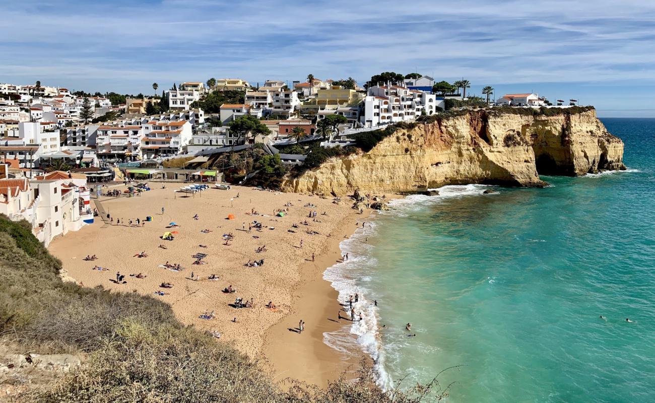 Foto af Praia de Carvoeiro med lys sand overflade