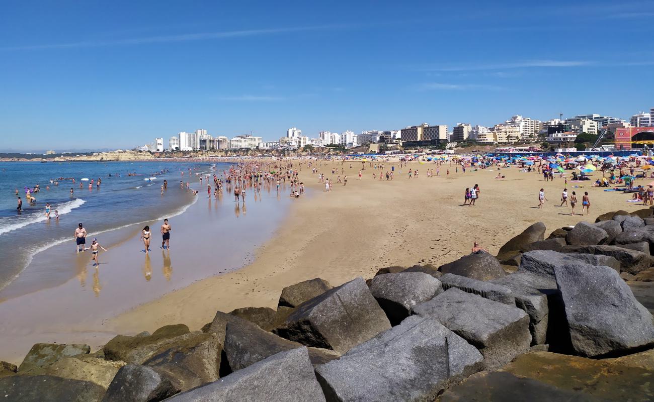 Foto af Praia da Rocha med lys fint sand overflade