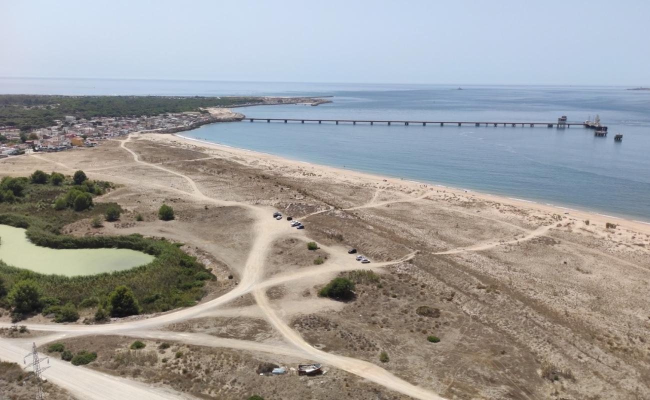 Foto af Praia Trafaria med lys sand overflade