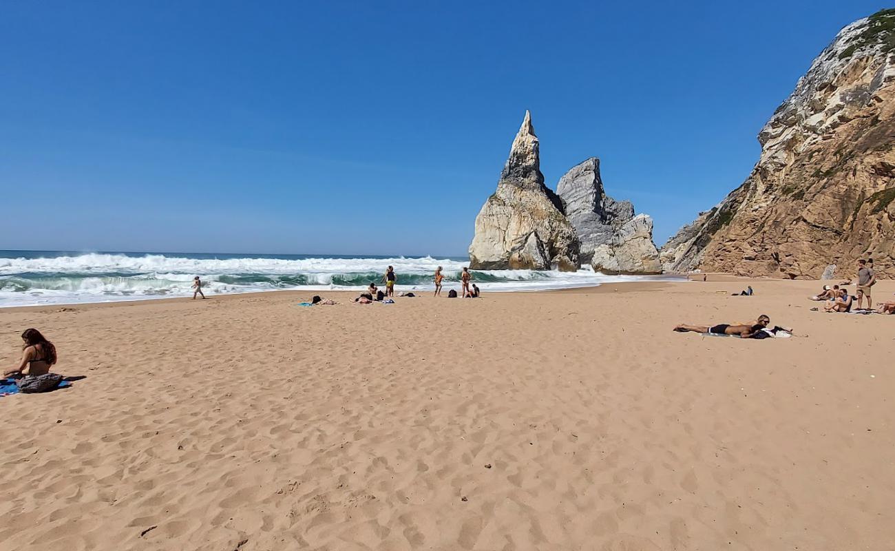 Foto af Praia da Aroeira med lys sand overflade