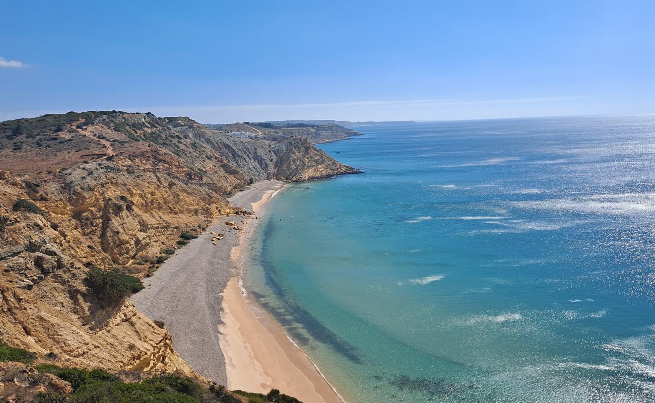 Foto af Praia dos Rebolos med grå sten overflade