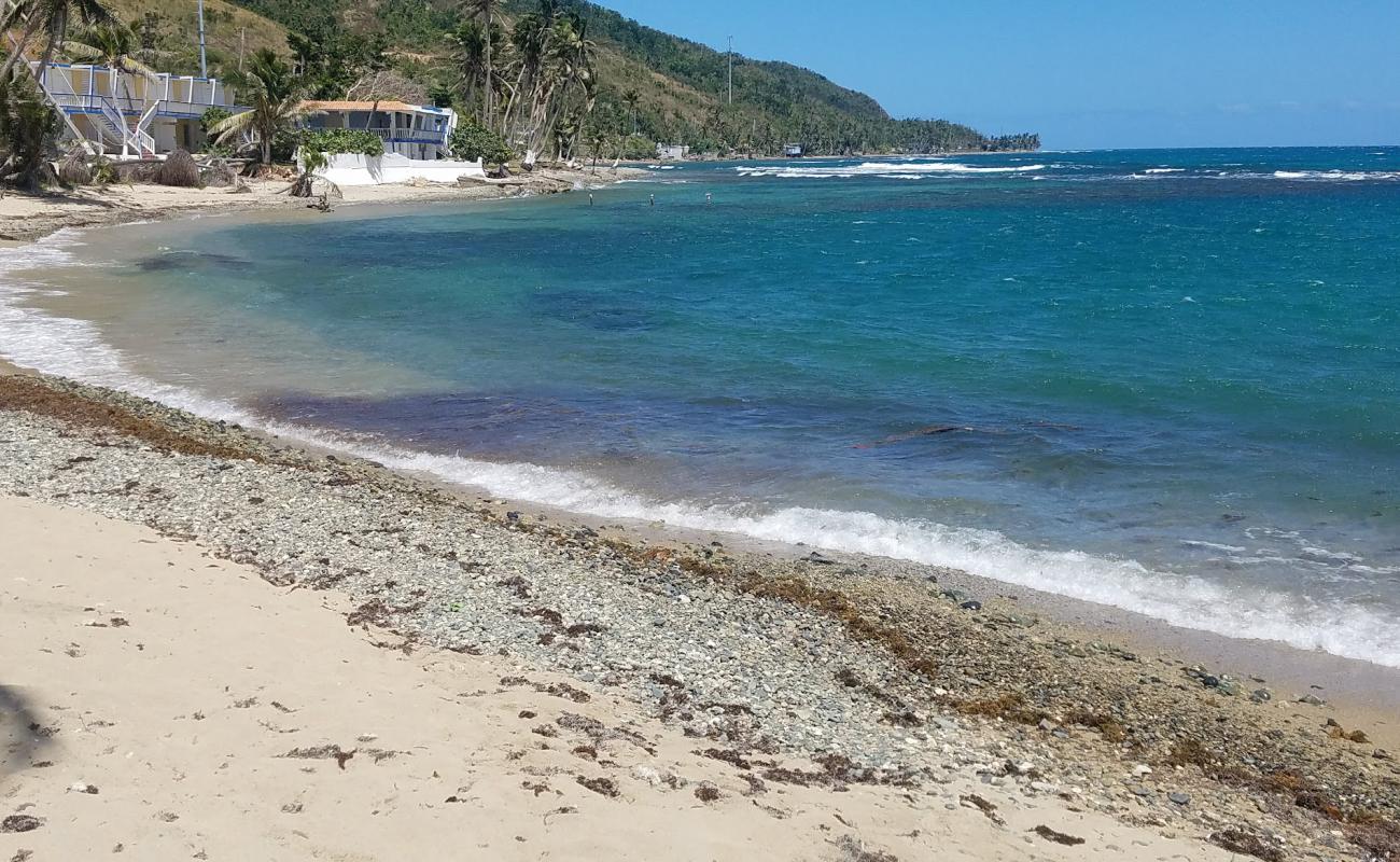 Foto af Playa Caribe med gråt sand og småsten overflade