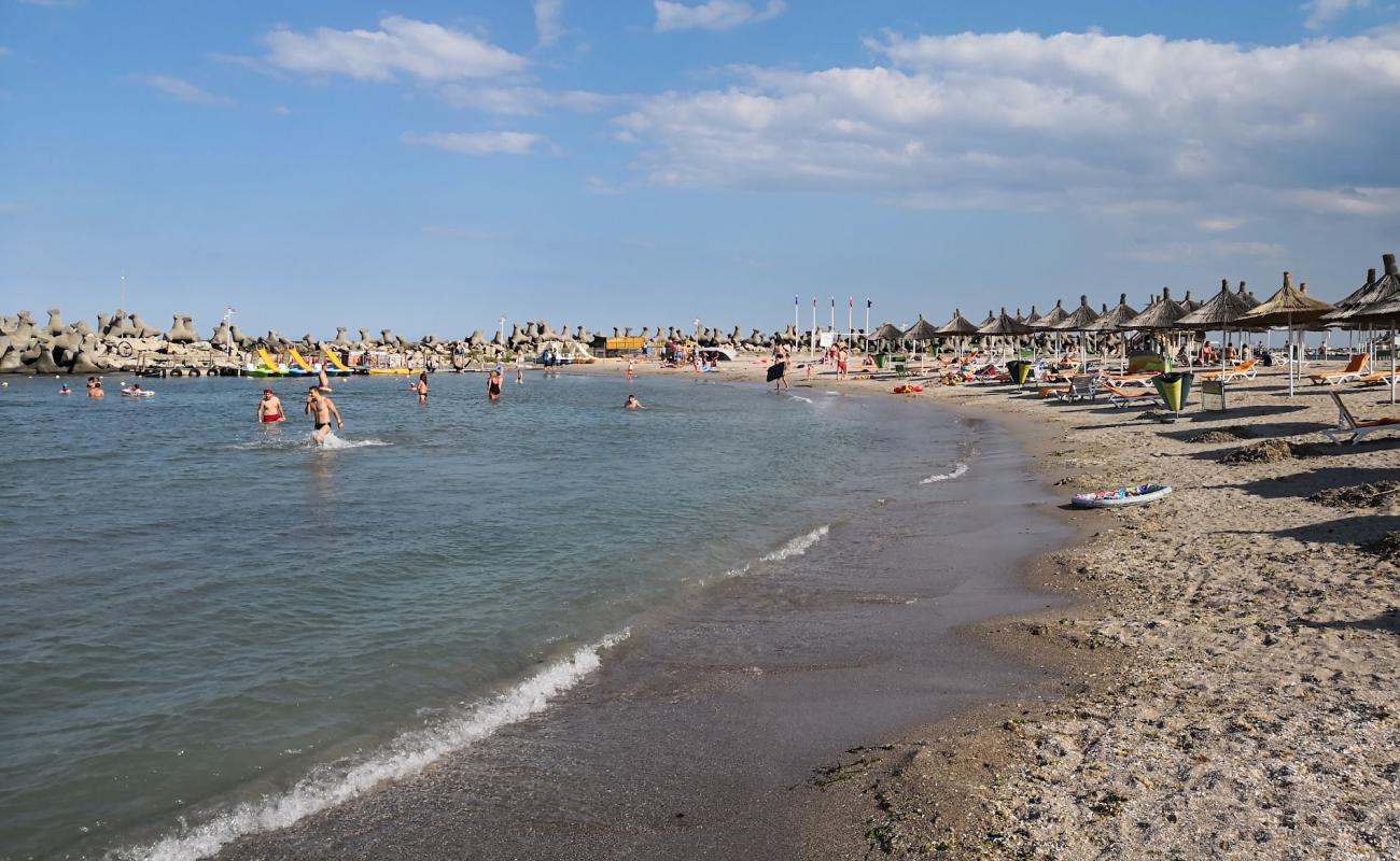 Foto af Saturn beach med lys sand overflade