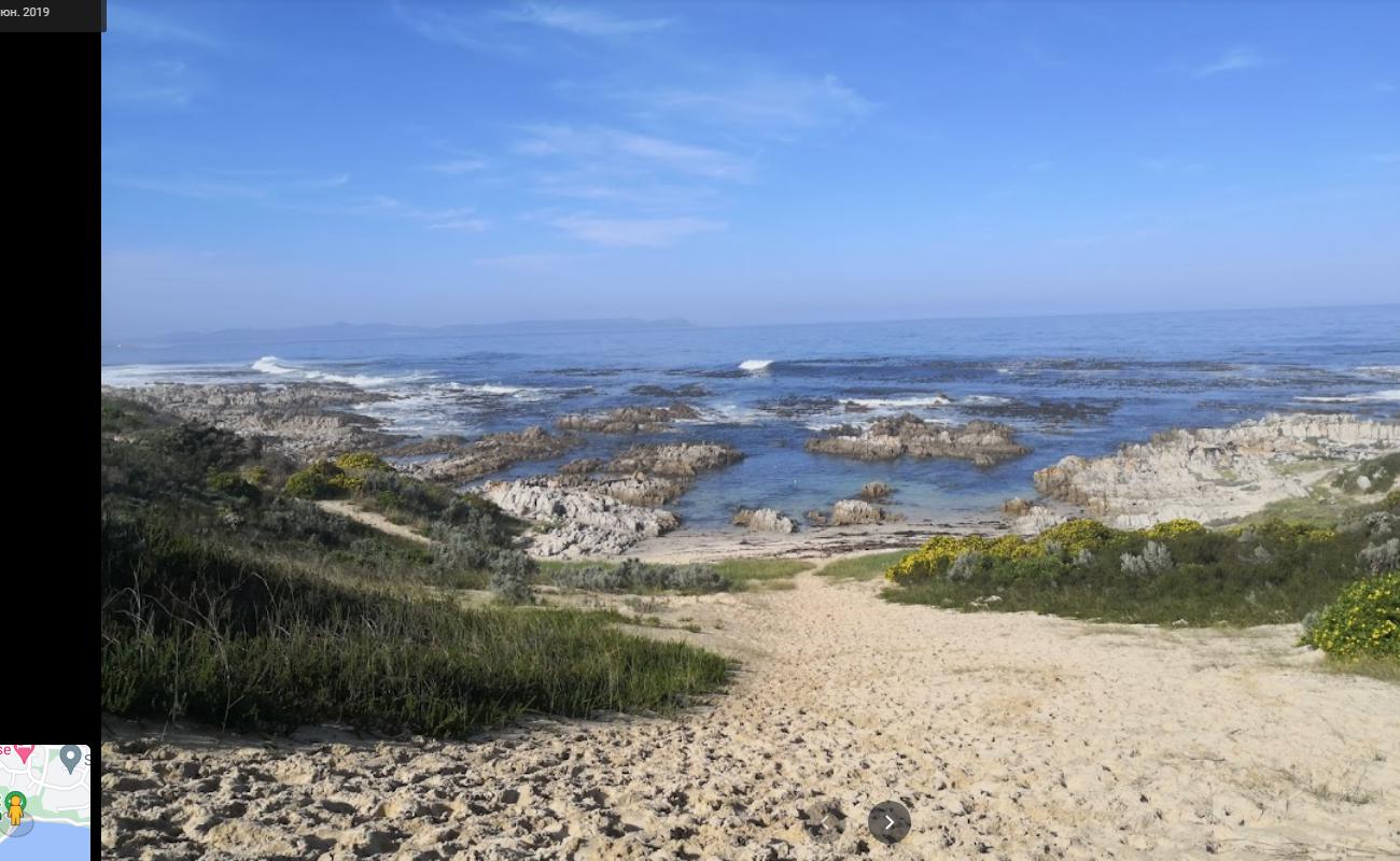 Foto af Breakfast Bay beach med lyst sand & sten overflade