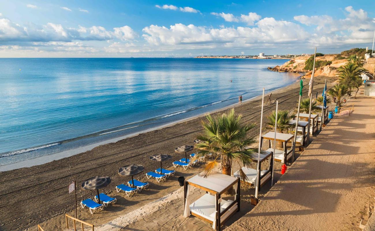 Foto af Playa Punta Prima med brunt sand overflade