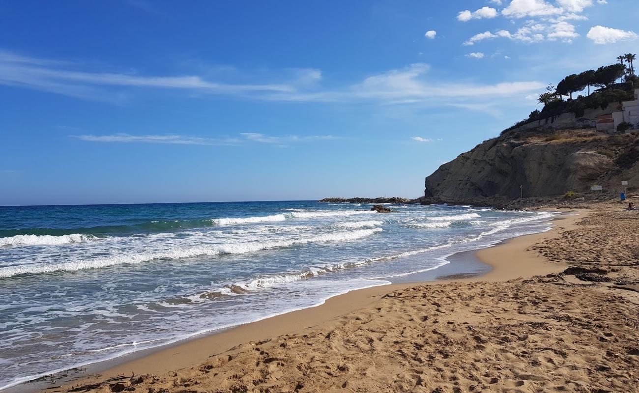 Foto af Cala lanuza med brunt sand overflade