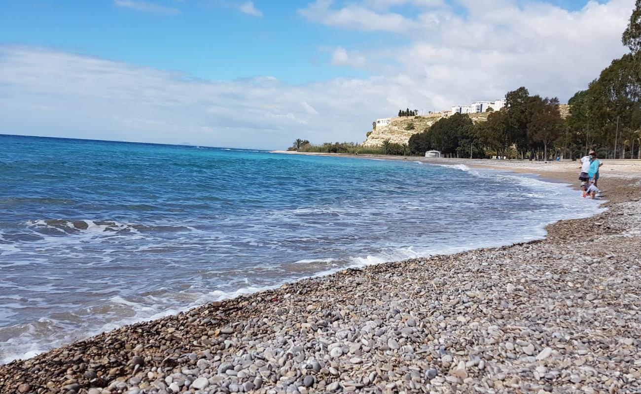 Foto af Torres Strand med sort sand og småsten overflade