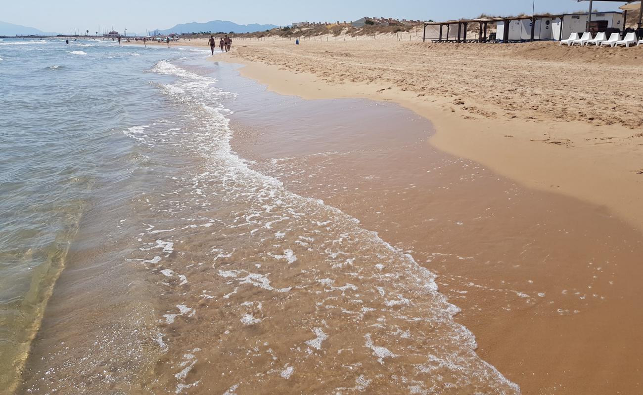 Foto af Platja Aigua Blanca med brunt sand overflade