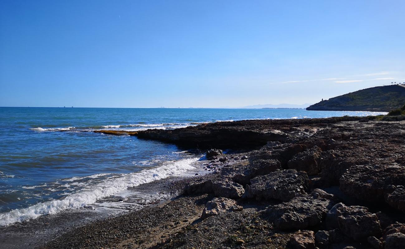 Foto af Playa Pesca Santi med brunt sand og sten overflade