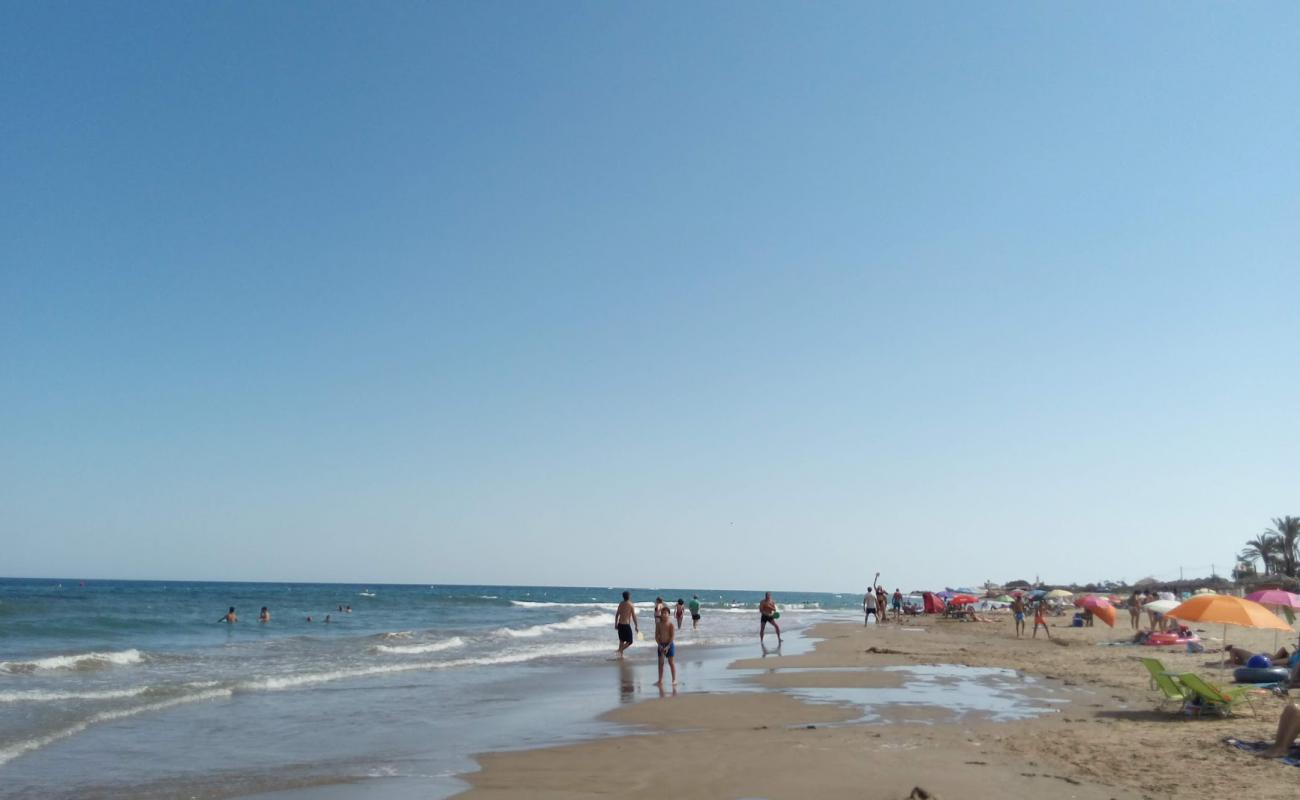 Foto af Platja de Manyetes med gråt sand og sten overflade