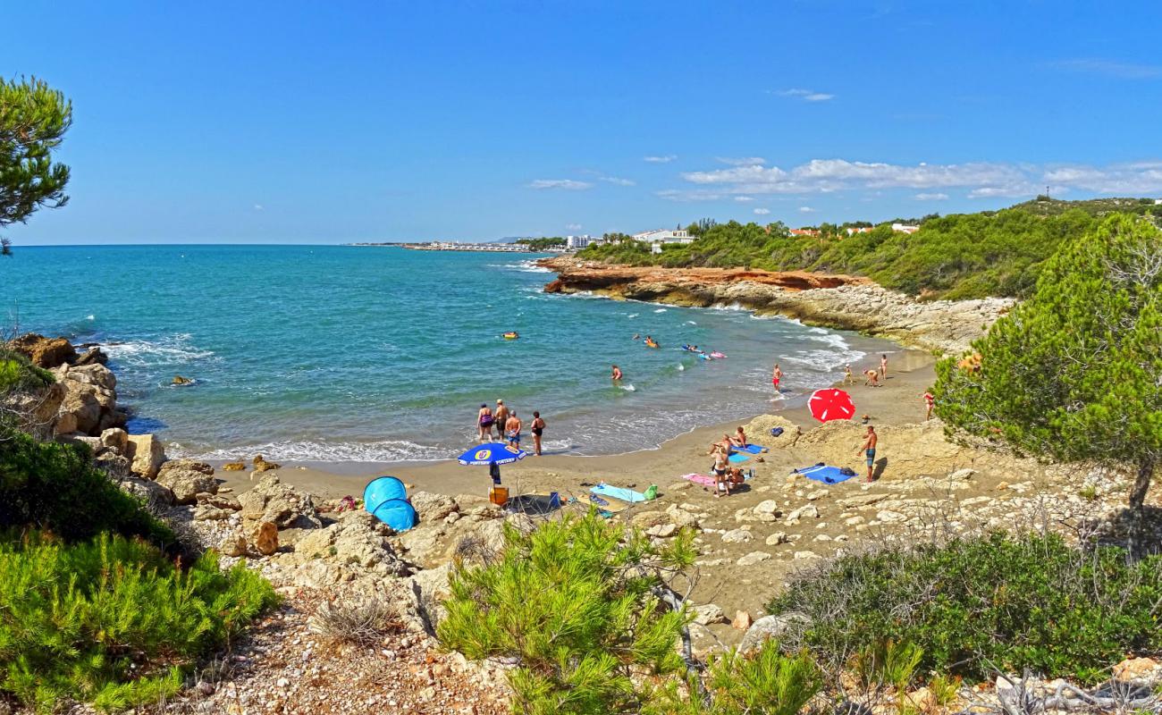 Foto af Cala Blanca med brunt sand overflade