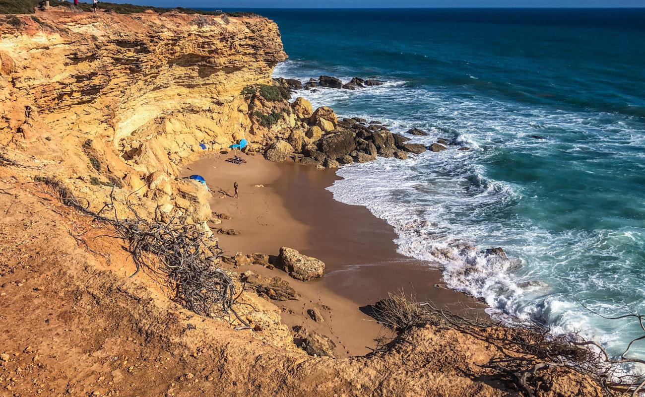 Foto af Cala del Faro med brunt sand overflade