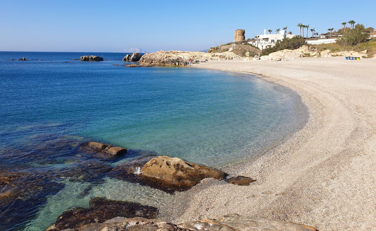 Foto af Calita Playa med gråt skallesand overflade