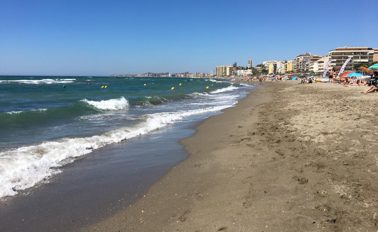 Foto af Playa de Carvajal med grå sand overflade