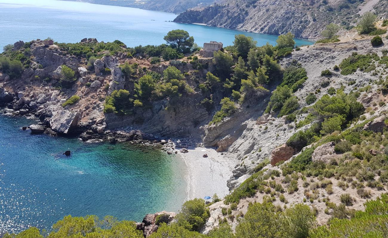 Foto af La Caleta beach med let fin sten overflade