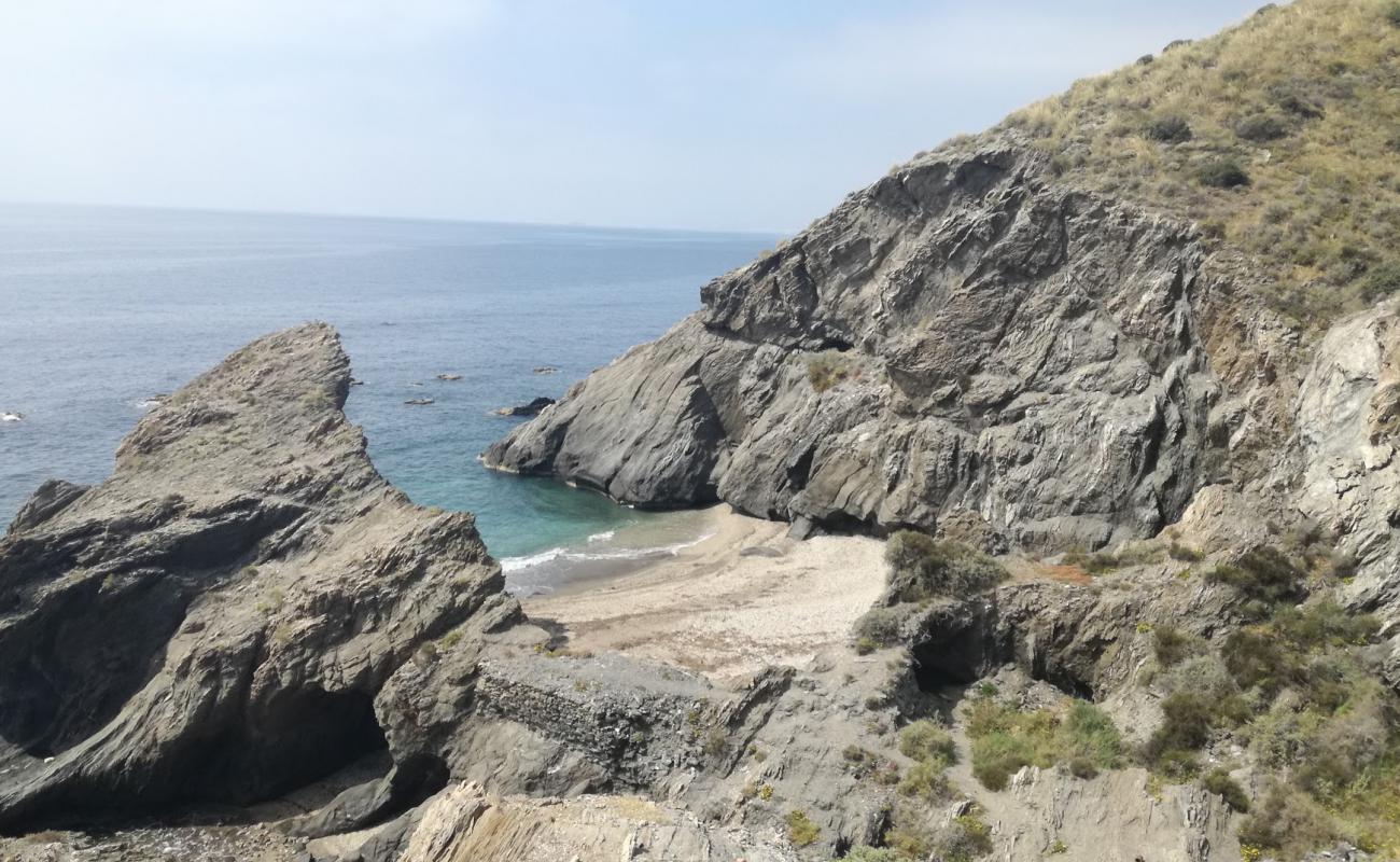 Foto af Cala Penon Cortado med grå fin sten overflade